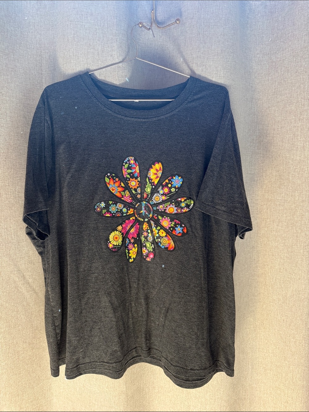 Black T-Shirt with Colorful Floral Daisy Graphic